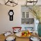 Wood-Look Pendulum Plastic Wall Clock, Vintage Farmhouse Decor for Living Room, Kitchen, or Dining Room, Silent Clock with Roman Numerals, Battery Powered, Large Decorative Wall Clock, Easy-to-Read
